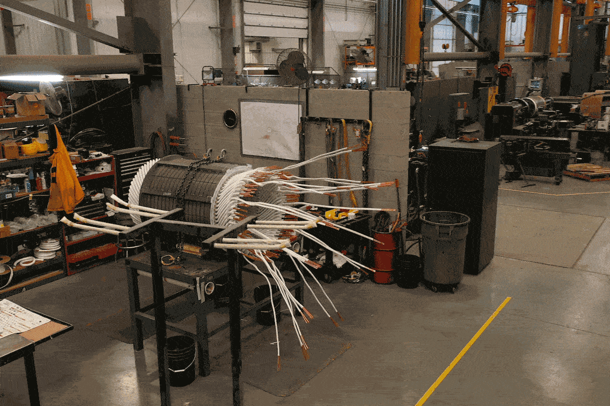 Moving image of an electric generator being re-coiled in the fully-equipped H&N Electric industrial repair facility