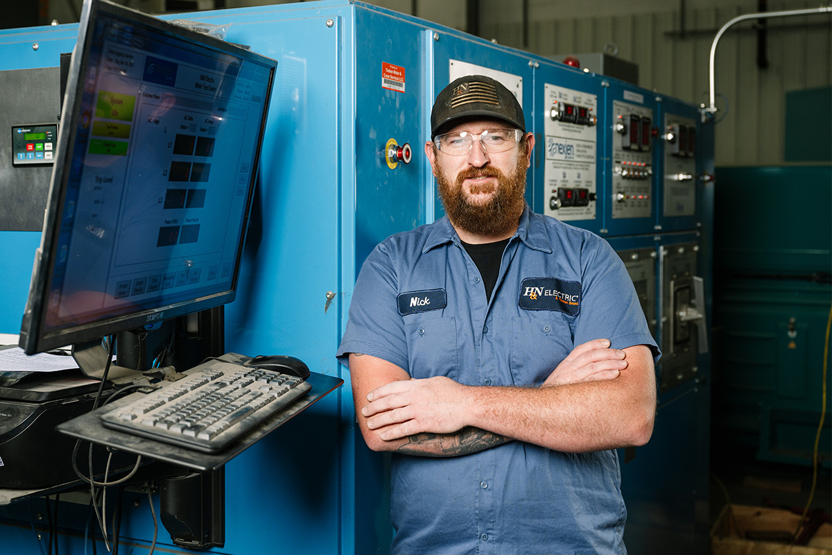 H&N Electric professional technician utilizing a preventative maintenance machine to support electric motors and generators.